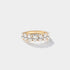Oval-cut lab-grown diamond eternity band with a shared-prong setting in 14K yellow gold.