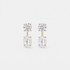 Round lab-grown diamond studs paired with oval lab-grown diamond earring jackets in 14k yellow gold.