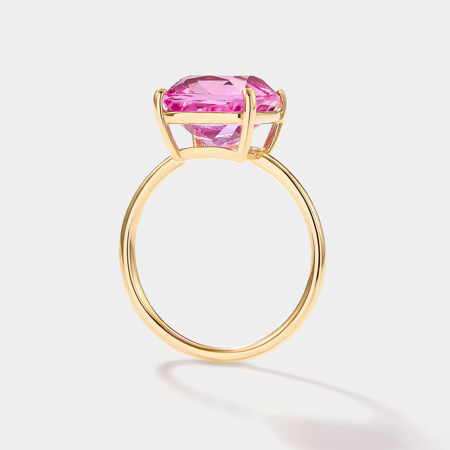 Cushion cut lab grown pink sapphire ring in 14k gold