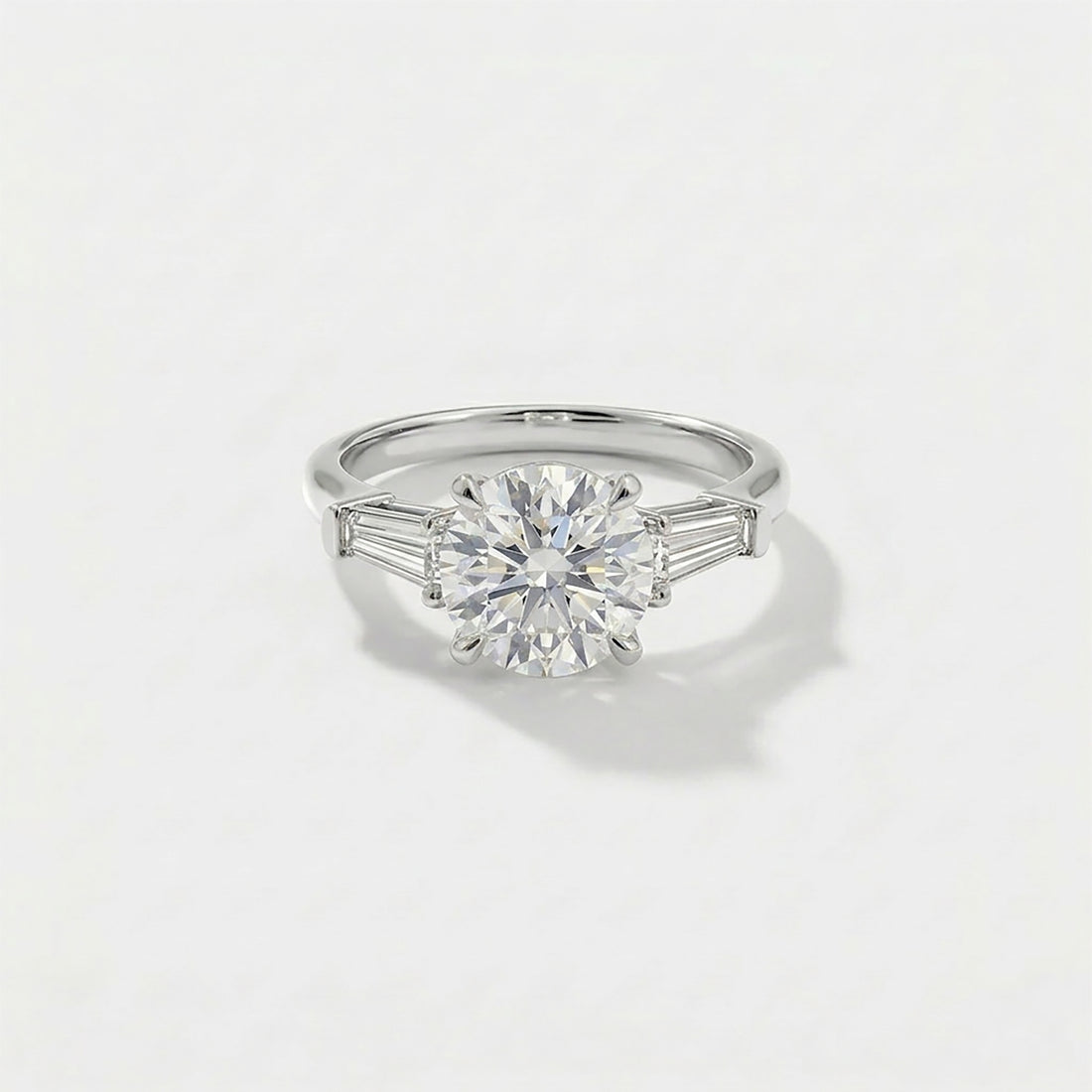 Round tapered baguette lab-grown diamond engagement ring in 14K white gold by Cove Fine Jewelry 