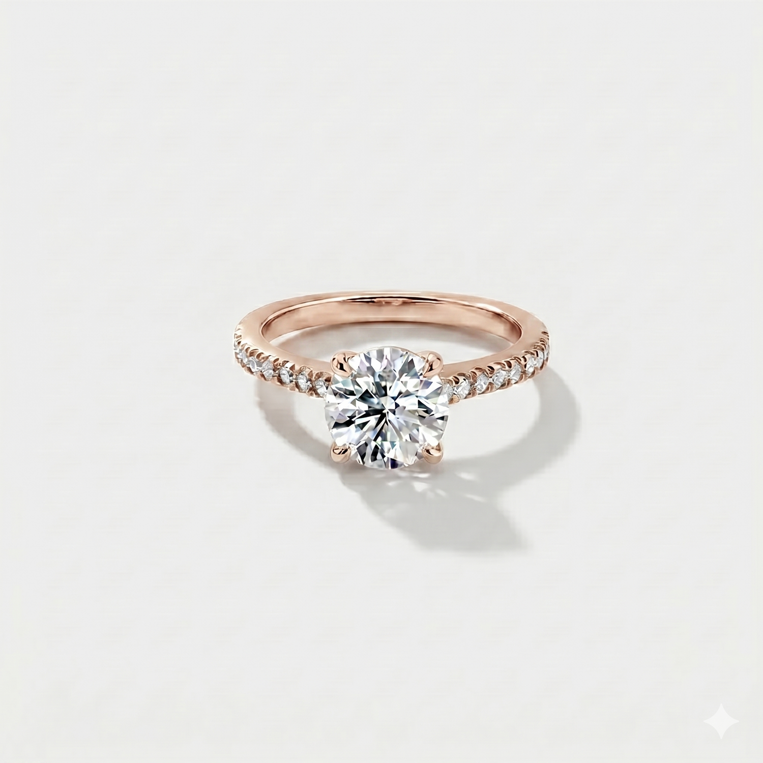 Round cathedral halo lab-grown diamond engagement ring in 14K rose gold by Cove Fine Jewelry
