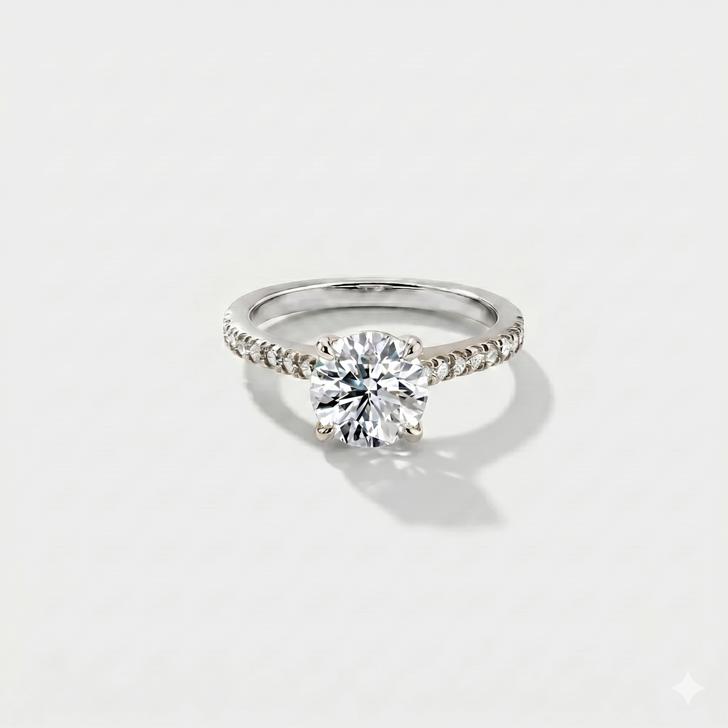 Round cathedral halo lab-grown diamond engagement ring in 14K white gold by Cove Fine Jewelry