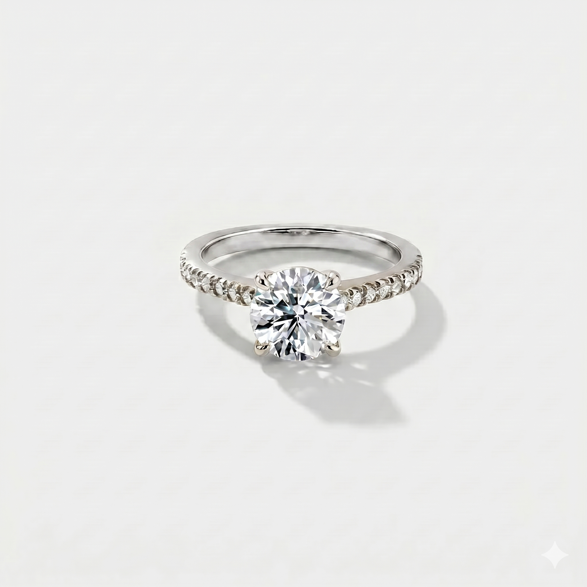 Round cathedral halo lab-grown diamond engagement ring in 14K white gold by Cove Fine Jewelry
