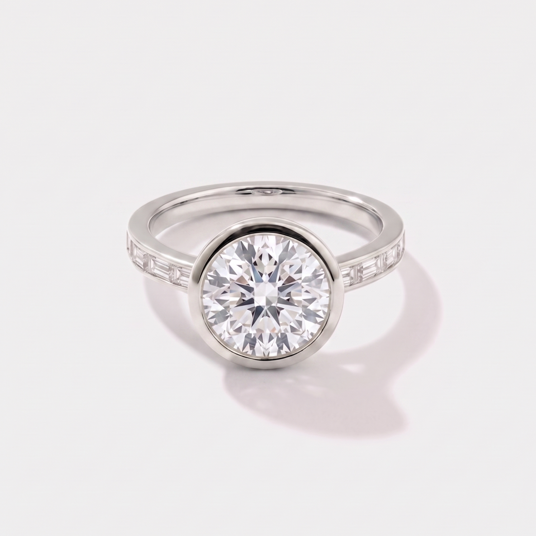 Round channel set solitaire lab-grown diamond engagement ring in 14K white gold by Cove Fine Jewelry