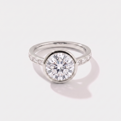 Round channel set solitaire lab-grown diamond engagement ring in 14K white gold by Cove Fine Jewelry