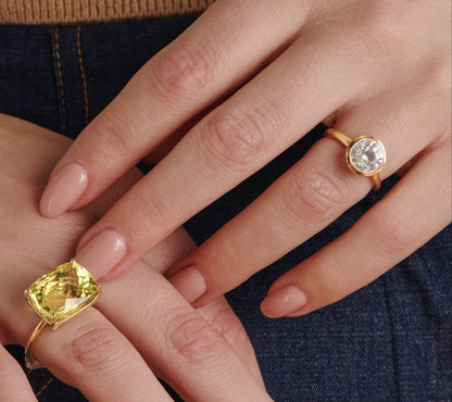 Close-up of round half bezel solitaire lab-grown diamond engagement ring setting