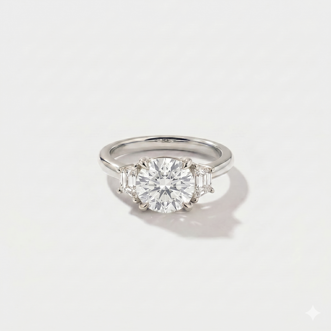 Round three stone lab-grown diamond engagement ring in 14K white gold by Cove Fine Jewelry