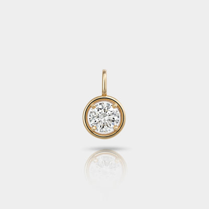 A handcrafted white gold solitaire pendant featuring a round lab-grown diamond set in a minimalist bezel, designed by Cove Fine Jewelry and made in the USA.
